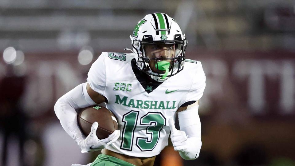 Marshall wide receiver EJ Horton (13) carries the ball against Troy during an NCAA football game on Saturday, Sept. 24, 2022 in Troy, Ala. | Butch Dill, Associated Press