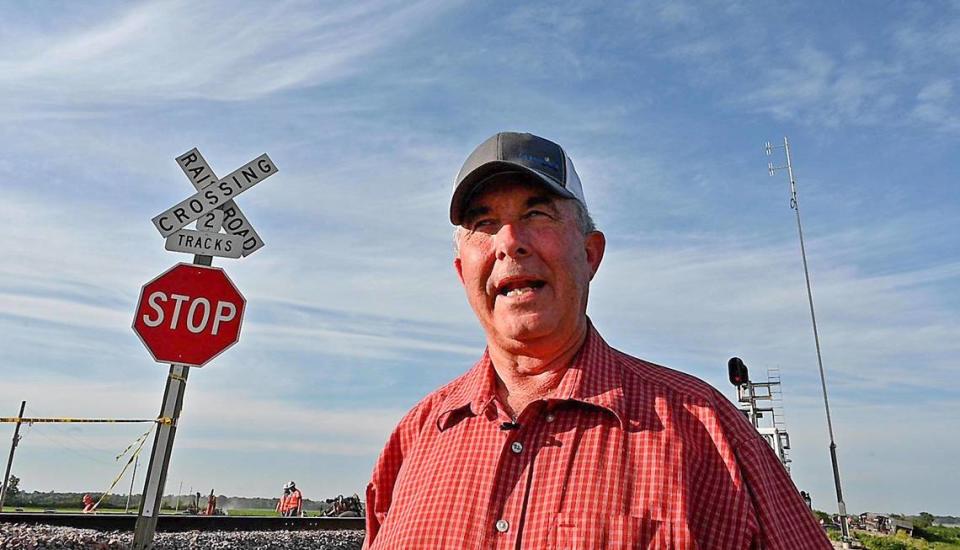 “We have to cross this with farm equipment to get to several of our fields,” Mike Spencer, 64, recently wrote on Facebook. “We have been on the RR for several years about fixing the approach by building the road up, putting in signals, signal lights or just cutting the brush back.”