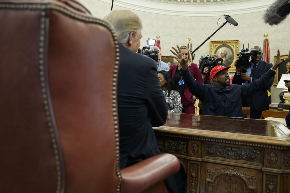 President Donald Trump meets with rapper Kanye West in the Oval Office of the White House, Thursday, Oct. 11, 2018, in Washington. (AP Photo/Evan Vucci)