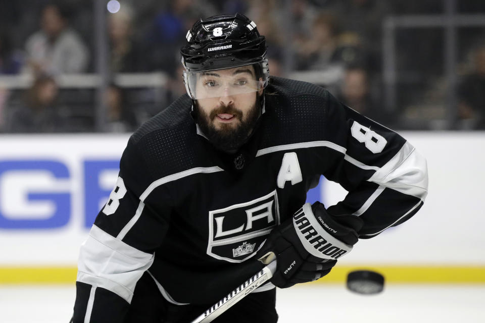 Los Angeles Kings' Drew Doughty (8) eyes the puck after a faceoff during the first period of the team's NHL hockey game against the Philadelphia Flyers on Tuesday, Dec. 31, 2019, in Los Angeles. (AP Photo/Marcio Jose Sanchez)