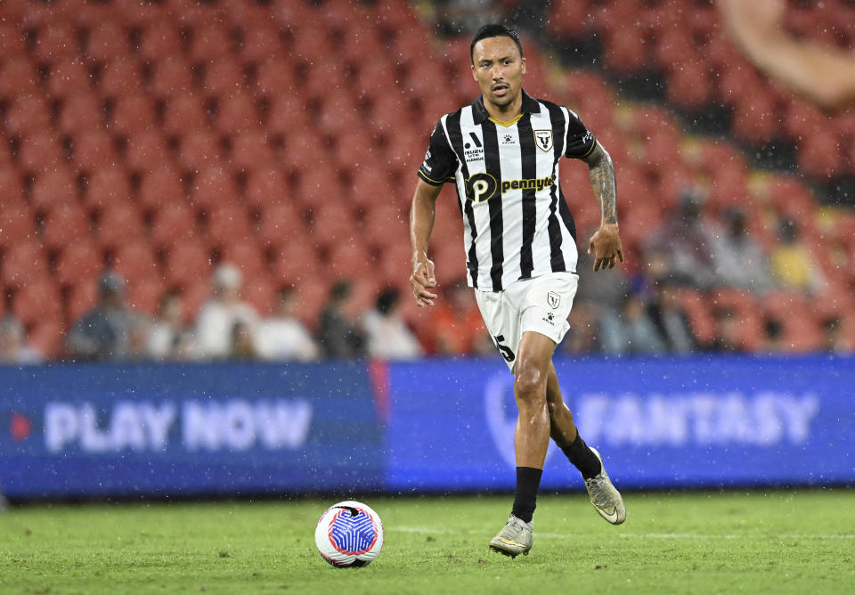 Macarthur FC player Kearyn Baccus passes the ball during an A-League match Brisbane Roar in Brisbane on Jan. 18, 2024. Baccus and fellow players Ulises Davila and Clayton Lewis have been arrested, Friday, May 17, 2024, over their alleged involvement in a the betting fix, which police say has led to hundreds of thousands of dollars being paid out in winnings. (Darren England/AAP Image via AP)