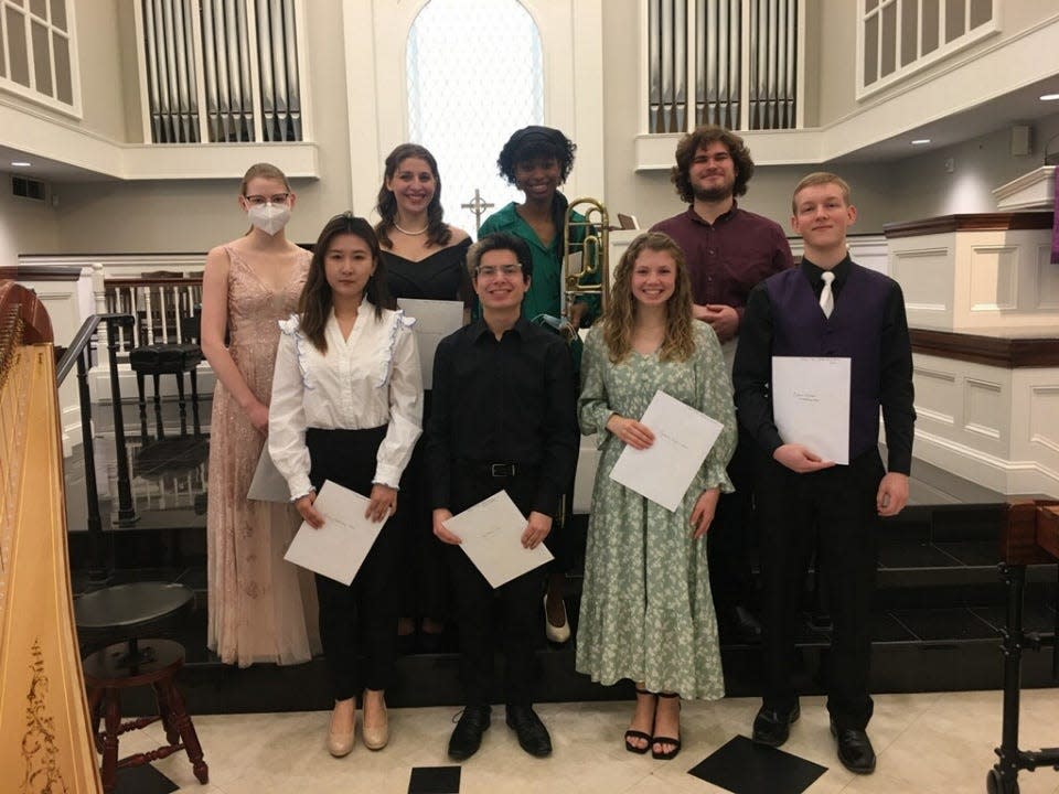 College first-place winners, shown left to right front row, are Jennifer Zhang, Jace Harris, Madeline Hager and Ezekiel Malone; back row, Audrey Jergensen, Macey Trussell, Naomi Wharry and Chris Maxwell.