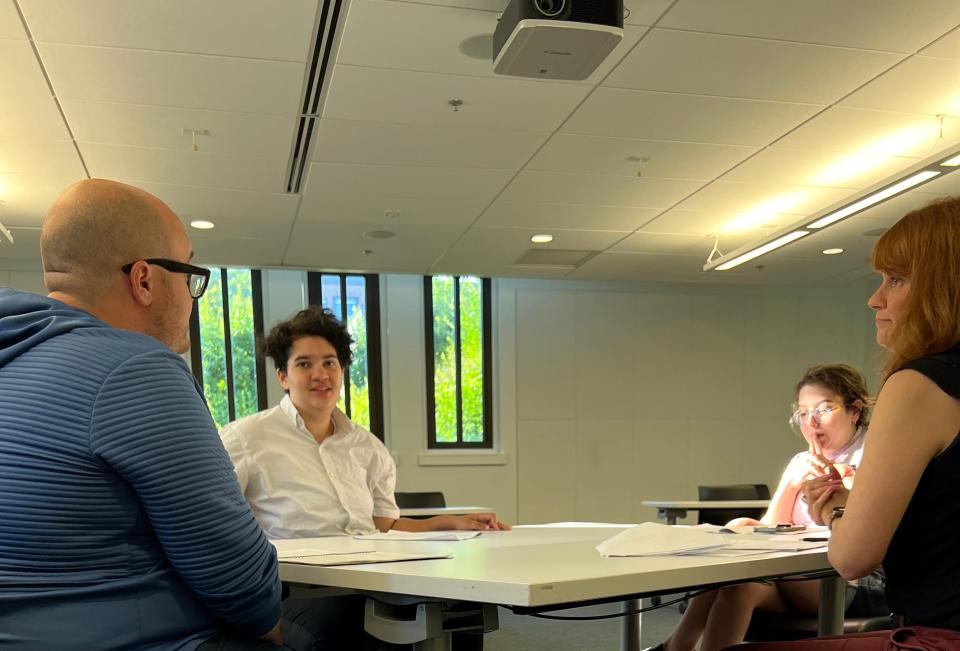 Dallas Ray as Baby Boomer with, left to right, Willow Cook as Gen Z, Michelle Sandler as Millennial, and Sheree Evans as Generation X in "The Generational Table" by Kendall Crotty, part of the MadLab production of Young Writers Short Play Festival 2022.