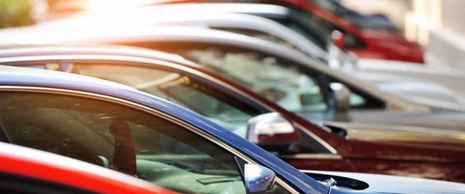 Group of cars parked in a row