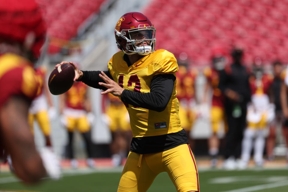 Apr 15, 2023; Los Angeles, CA, USA; USC Trojans quarterback <a class="link " href="https://sports.yahoo.com/ncaaf/players/322513" data-i13n="sec:content-canvas;subsec:anchor_text;elm:context_link" data-ylk="slk:Caleb Williams;sec:content-canvas;subsec:anchor_text;elm:context_link;itc:0">Caleb Williams</a> (13) throws a pass during the Spring Game at Los Angeles Memorial Coliseum. Mandatory Credit: Kiyoshi Mio-USA TODAY Sports