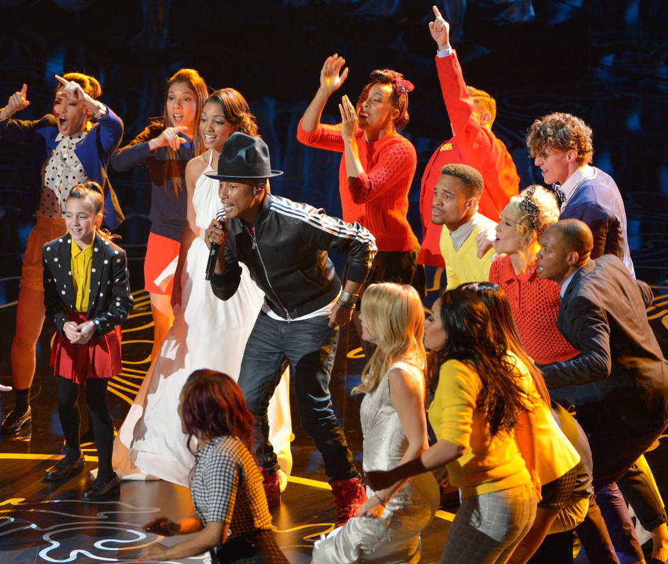 Pharrell Williams, center, performs "Happy" during the Oscars at the Dolby Theatre on Sunday, March 2, 2014, in Los Angeles. (Photo by John Shearer/Invision/AP)