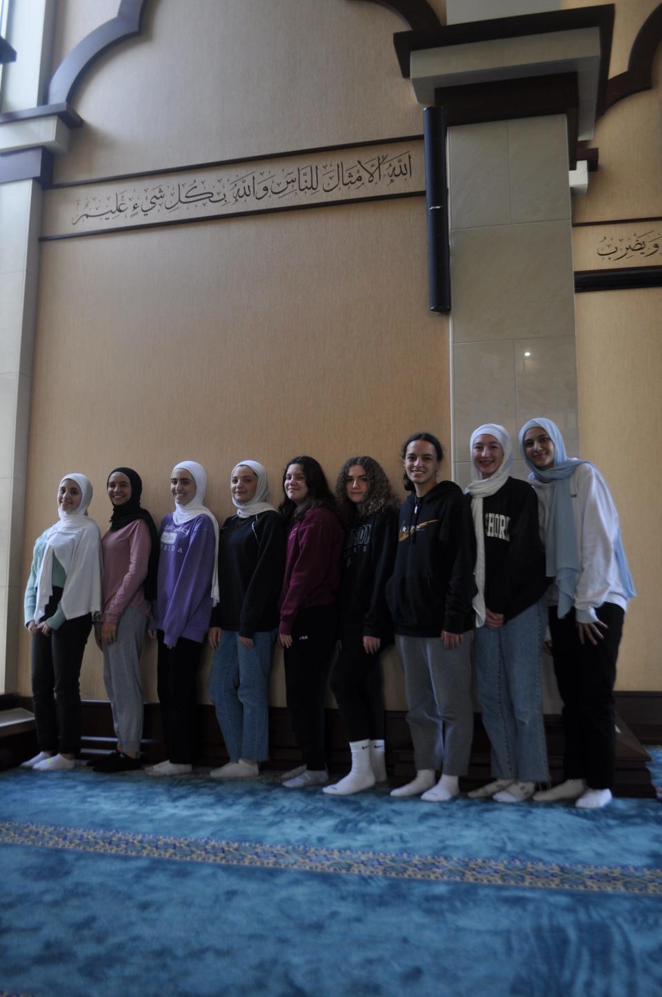 Nine Muslim students who attend the Noor Islamic Cultural Center, 5001 Wilcox Road, in Hilliard started a petition drive to ask Hilliard City Schools to name two Muslim holidays as district holidays. Pictured from the left inside the Noor Islamic Cultural Center are Ranim Farra, a freshman at Worthington Kilbourne High School; Bushrah Alhyari, a freshman at Dublin Coffman High School; Ayah Azrak, a freshman at Metro Early College; Salma Khawam, a sophomore at Davidson High School; Randa Khawam, a seventh-grade student at Weaver Middle School; Nour Hafez, an eighth-grade student at Hilliard Weaver Middle School; Layan Aburomeh, an eighth-grade student at Dublin Karrer Middle School; Tesneem Shabsigh, an eighth-grade student at Karrer Middle School; and Saja Mu'ammar, an eighth-grade student at Hilliard Memorial Middle School.