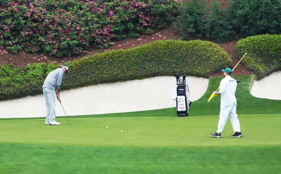 Apr 9, 2024; Augusta, Georgia, USA; Bubba Watson putts on no. 12 during a practice round for the Masters Tournament golf tournament at Augusta National Golf Club. Mandatory Credit: Kyle Terada-USA TODAY Network