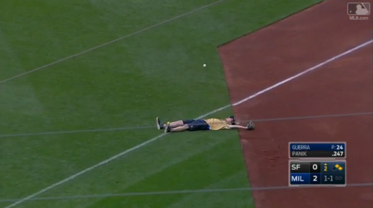 This Brewers ballboy had a tough time with his ground ball. (MLB.com Screenshot)