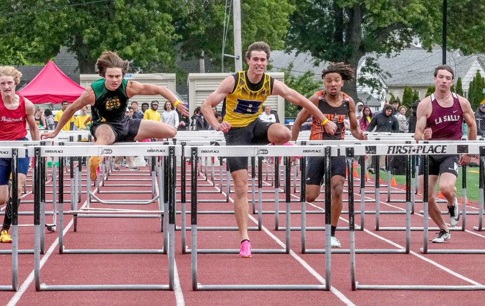 Barrington's Ethan Knight on his way to winning 100-meter hurdles in spring 2023.