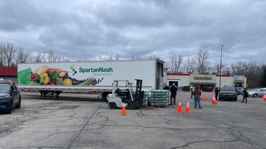 Water bottles are being distributed by Spartan Nash in partnership with the City of Grand Rapids during a boil water advisory. (March 18, 2024)