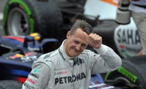 Michael Schumacher gives the thumb up at the end of the Brazilian Grand Prix. After 21 years, seven drivers' championship triumphs and 91 victories, the 43-year-old Schumacher recovered from an early puncture to score points in his final outing