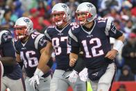 FILE - In this Oct. 30, 2016, file photo, New England Patriots' Tom Brady (12), Rob Gronkowski (87) and James Develin (46) head back to the sideline after LeGarrette Blount scored a touchdown during the second half of the team's NFL football game against the Buffalo Bills in Orchard Park, N.Y. Gronkowski says he is retiring from the NFL after nine seasons. Gronkowski announced his decision via a post on Instagram Sunday, March 24, 2019, saying that a few months shy of this 30th birthday “its time to move forward and move forward with a big smile.” (AP Photo/Bill Wippert, File)