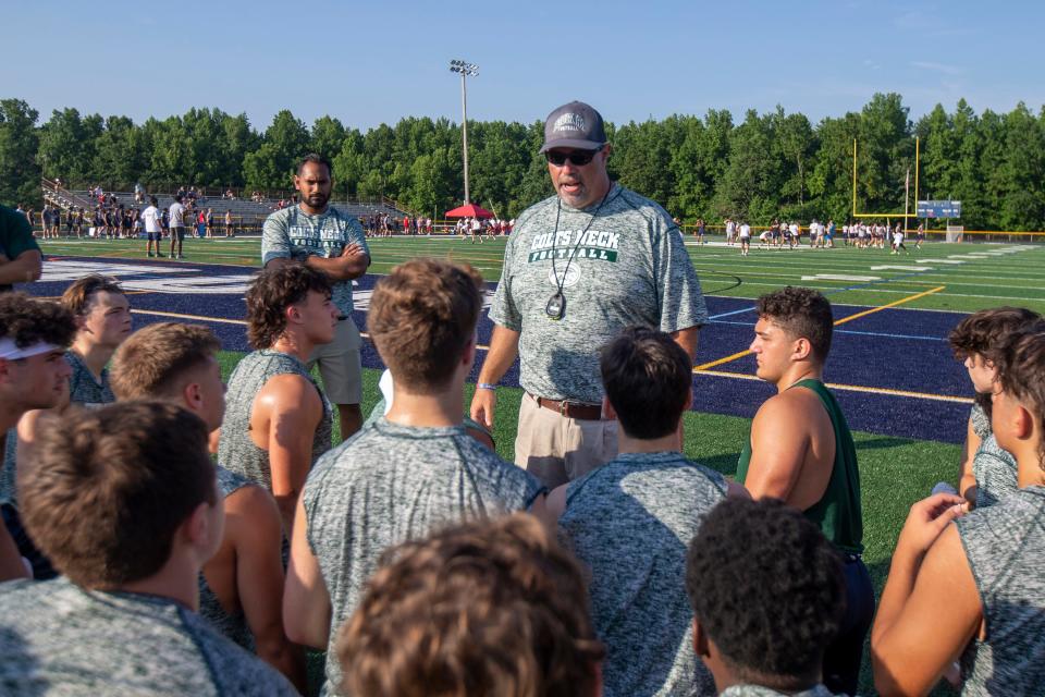 Colts Neck head coach Matt Ahearn coaches his team during the Freehold Regional high school 7 on 7 football tournament at Howell High School in Howell, NJ Thursday, July 21, 2022.