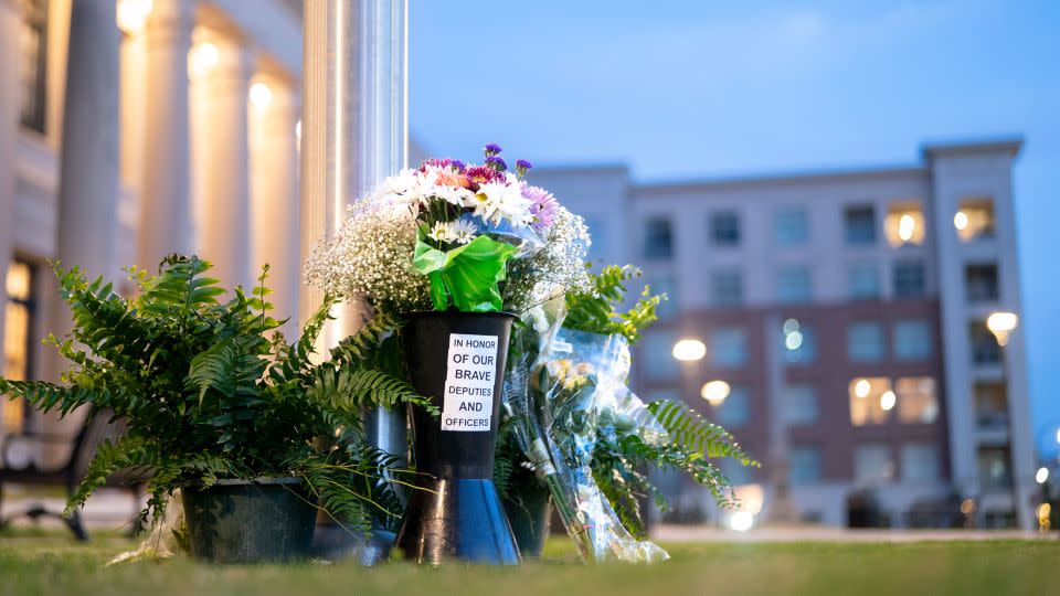Flowers in memory of fallen law enforcement officers are seen outside the Federal Courthouse on April 30, 2024, in Charlotte, North Carolina. - Sean Rayford/Getty Images