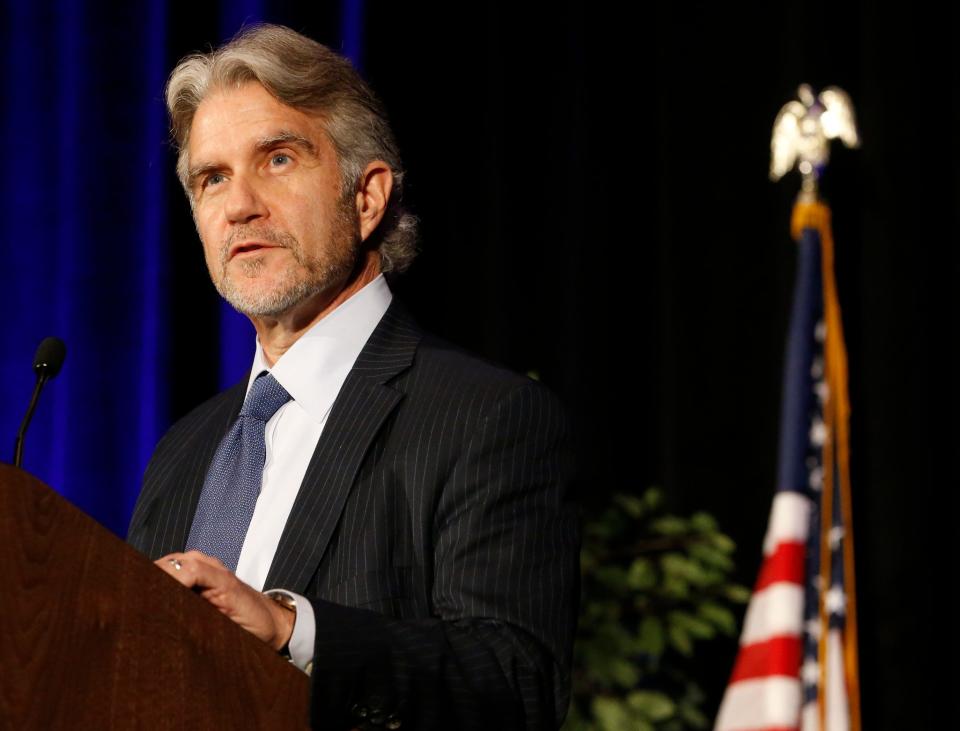 Bill Jones addresses the crowd before presenting this year's Business Person of the Year Award to John Harney at Business at Its Best that was held on Wednesday, Jan. 31, 2019 at Embassy Suites. 