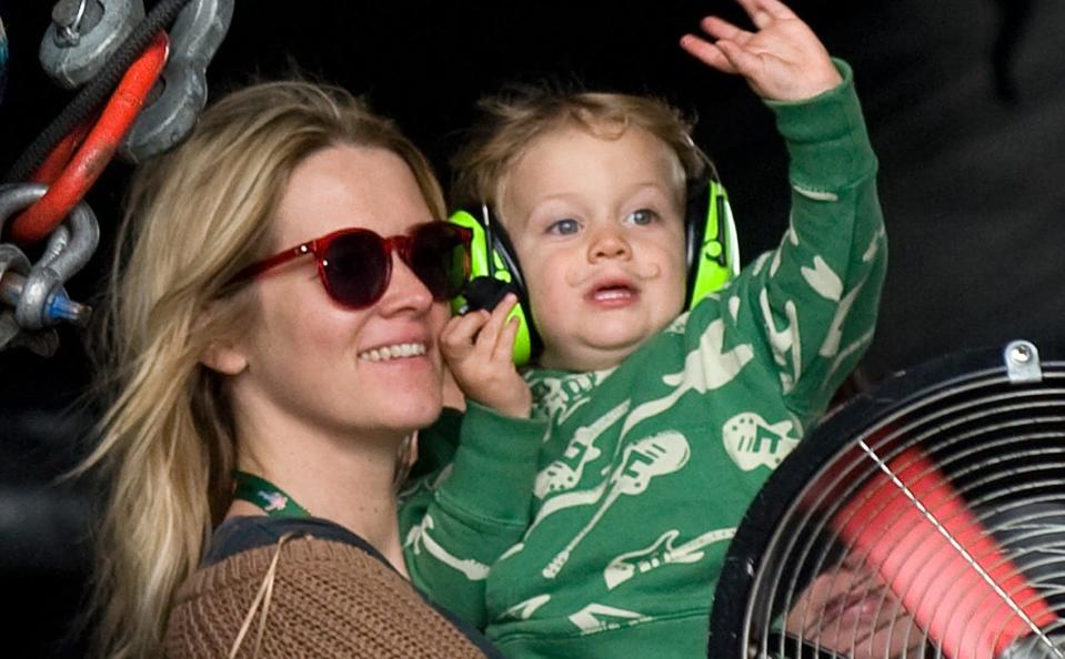 Bowman and son, Rudy, watch Editors perform at V Festival 2010