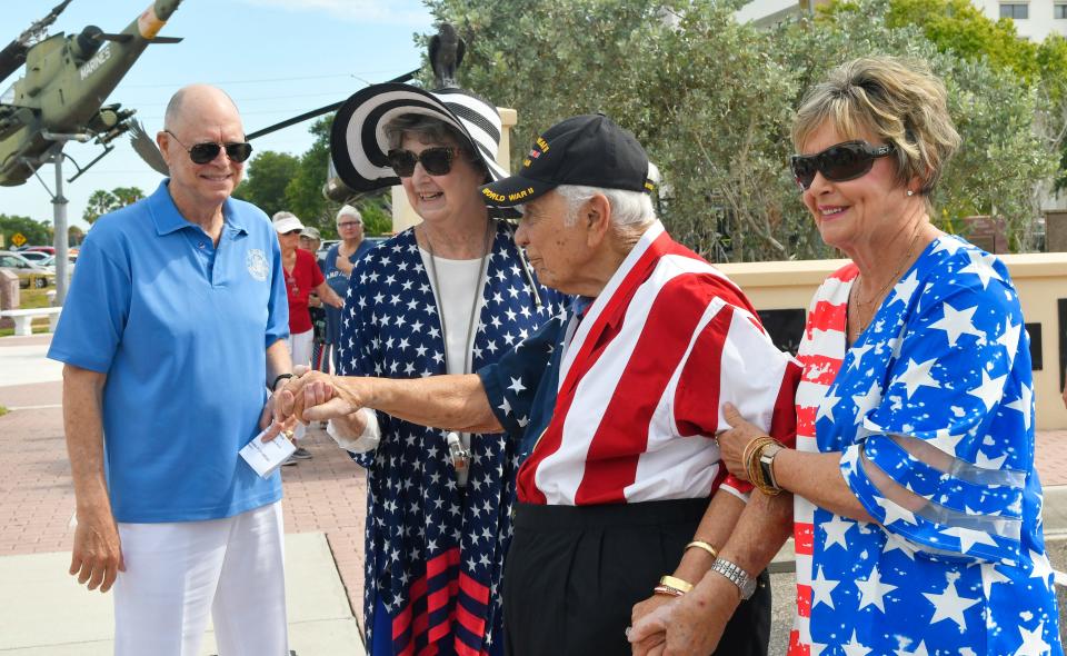 Retired Merchant Marine Capt. Ed Lanni, second from right, was presented a replica of the Merchant Mariners of World War II Congressional Gold Medal during a 2022 Memorial Day ceremony held at the Brevard Veterans Memorial Center on Merritt Island. With Lanni were, from left, U.S. Rep. Bill Posey, Shirley Lanni and Katie Posey.