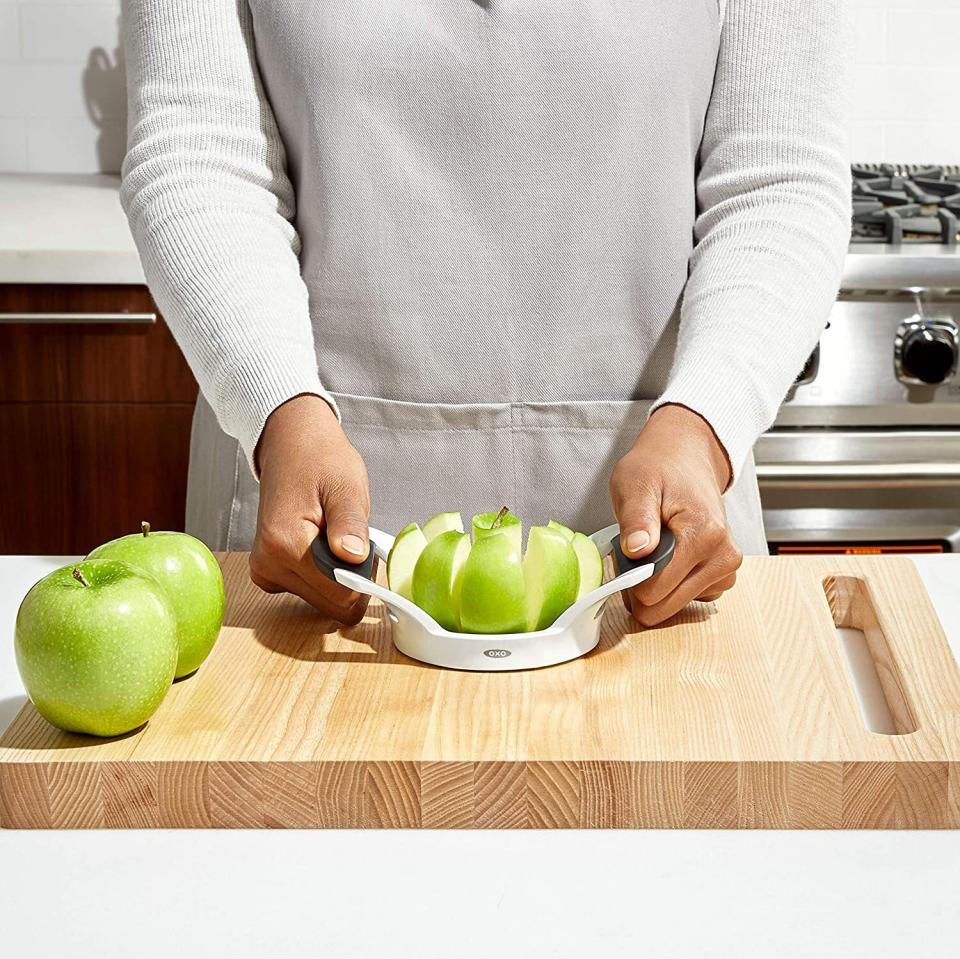 You'll be able to quickly cut a healthy snack without being late to your Zoom meeting.<br /><br /><strong>Promising review:</strong> "My husband laughed at this purchase questioning why we needed another gadget. Well, he ate his words the first time he tried it! <strong>This is the BEST gadget you never knew you needed.</strong> It perfectly cores and slices apples with a minimum of effort. It&rsquo;s the most-used gadget in our kitchen (we love apples). Highly recommend." &mdash; <a href="https://amzn.to/3ncQ86g" target="_blank" rel="noopener noreferrer">CT C</a><br /><br /><strong>Get it from Amazon for <a href="https://amzn.to/3tLoL5R" target="_blank" rel="noopener noreferrer">$9.99</a>.</strong>