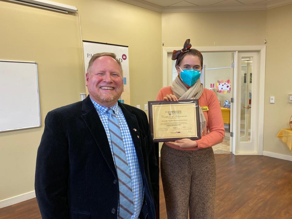 Rob Lesher, PA Forward program manager for the Pennsylvania Library Association, presented a plaque to Gina Vitale, director of Alexander Hamilton Memorial Free Library, Waynesboro, in recognition its third year as a Gold Star library.