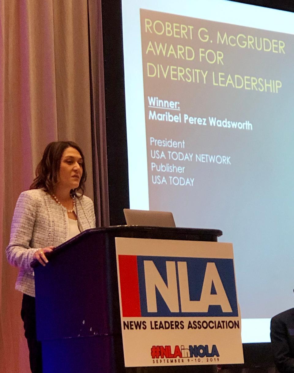 USA TODAY Network President Maribel Perez Wadsworth accepts the Robert G. McGruder Award for Diversity Leadership in New Orleans on Sept. 10, 2019.