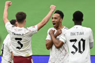 Arsenal's Pierre-Emerick Aubameyang, 2nd right, celebrates after scoring the opening goal during the English FA Community Shield soccer match between Arsenal and Liverpool at Wembley stadium in London, Saturday, Aug. 29, 2020. (Justin Tallis/Pool via AP)