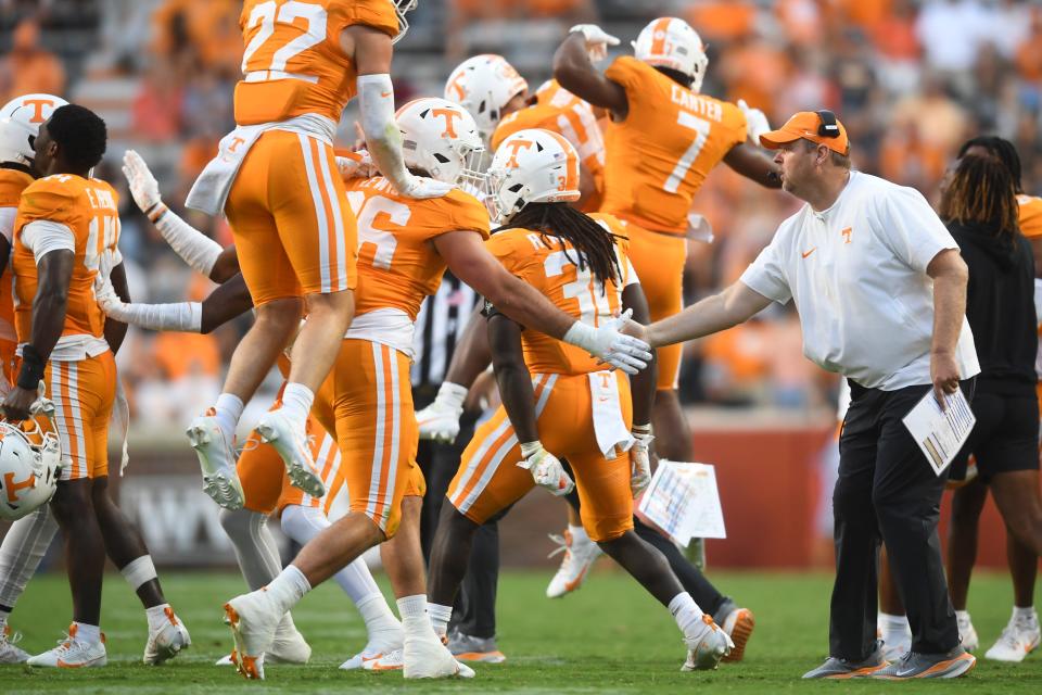 Tennessee head coach Josh Heupel and players celebrate during a football game between Tennessee and UTSA at Neyland Stadium in Knoxville, Tenn., on Saturday, Sept. 23, 2023. Tennessee defeated UTSA 45-14.