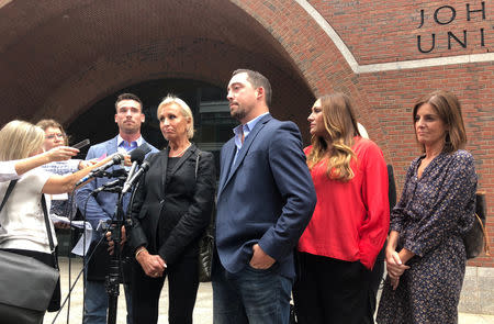 Michael DiSarro (L to R), Pamela DiSarro, Nick DiSarro and Colby DiSarro speak to reporters outside the federal courthouse following the sentencing of Francis Salemme in Boston, Massachusetts, U.S., September 13, 2018. REUTERS/Nate Raymond