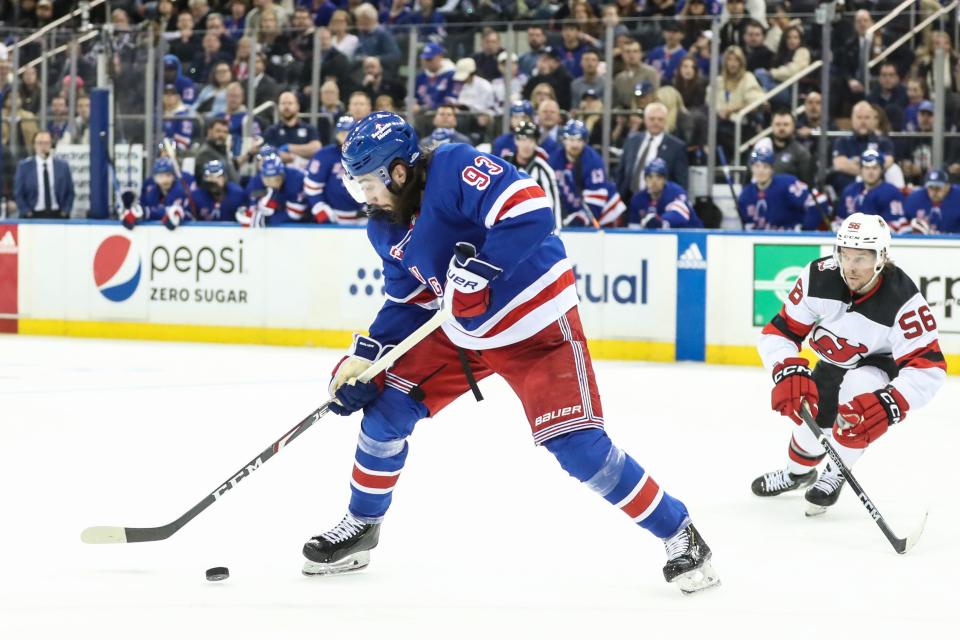 Apr 22, 2023; New York, New York, USA; New York Rangers center Mika Zibanejad (93) controls the puck in Game 3 of the first round of the 2023 Stanley Cup Playoffs against the New Jersey Devils at Madison Square Garden. Mandatory Credit: Wendell Cruz-USA TODAY Sports