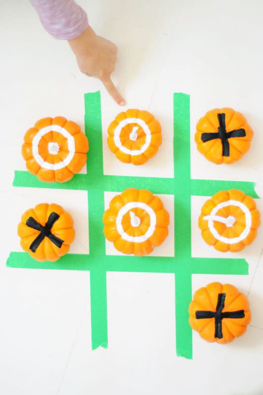 <p>Project Kid</p><p>Use your leftover pumpkins (big or small) to play a game of tic-tac-toe, like the one <a href="https://projectkid.com/mini-pumpkin-tic-tac-toe/" rel="nofollow noopener" target="_blank" data-ylk="slk:Project Kid;elm:context_link;itc:0;sec:content-canvas" class="link rapid-noclick-resp"><em>Project Kid</em></a> did. We bet that adults will even want to participate!</p>