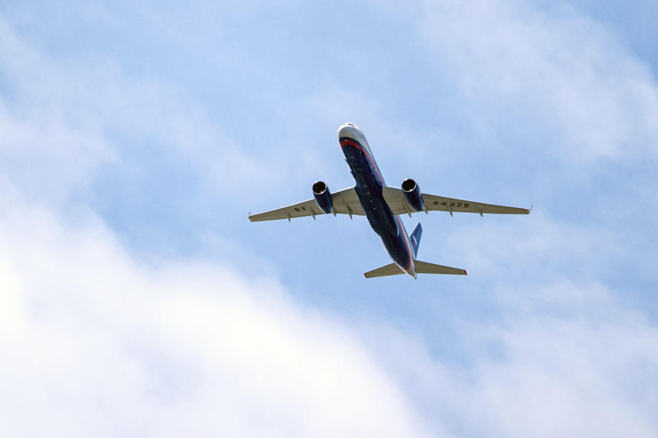 FILE In this file photo taken on Friday, April 26, 2019, A Russian Air Force Tu-214 flies over Offutt Air Force Base, Friday, April 26, 2019, in Omaha, Neb. The flight is allowed as part of the Open Skies Treaty. China, is lashing out at Washington over its withdrawal from the "Open Skies Treaty" with Russia, saying the move undermines military trust and transparency and imperils future attempts at arms control. The Russian parliament's lower house has voted to withdraw from an international treaty allowing surveillance flights over military facilities following the U.S. departure from the pact. (Chris Machian/Omaha World-Herald via AP, File)