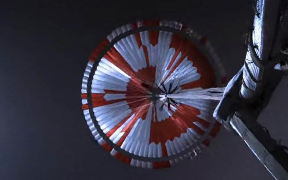 An image captured by the rover looking up its parachute during the descent - GETTY IMAGES