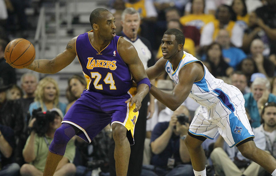 New Orleans Hornets guard Chris Paul defends Los Angeles Lakers guard Kobe Bryant in the 2011 Western Conference quarterfinals. (Jeff Zelevansky/Getty Images)