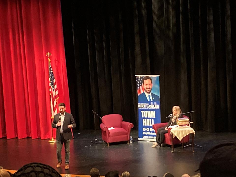 A supporter of Israel stood with an Israeli flag by the entrance to Building 7 at Rockland Communty College for Rep. Mike Lawler's Town Hall on Nov. 19, 2023.