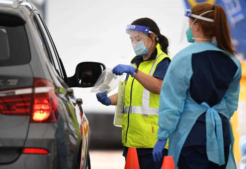 A person is tested at a coronavirus testing facility at Bondi Beach in Sydney.