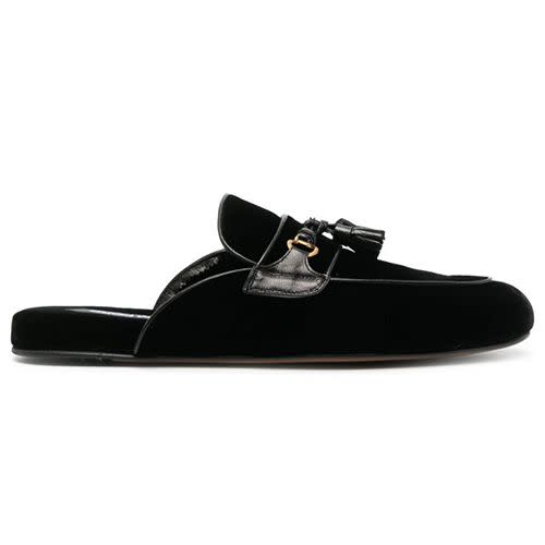 <p><a class="link " href="https://www.brownsfashion.com/uk/shopping/tom-ford-black-tassel-trim-velvet-slippers-19088980" rel="nofollow noopener" target="_blank" data-ylk="slk:SHOP;elm:context_link;itc:0;sec:content-canvas">SHOP</a></p><p>There’s nothing Tom Ford can’t sex up, a slipper included. This one seduces with black velvet, gold hardware and a tassel detail at the vamp. </p><p>£1,100; <a href="https://www.brownsfashion.com/uk/shopping/tom-ford-black-tassel-trim-velvet-slippers-19088980" rel="nofollow noopener" target="_blank" data-ylk="slk:brownsfashion.com;elm:context_link;itc:0;sec:content-canvas" class="link ">brownsfashion.com</a></p>