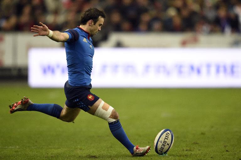 France's scrum-half Morgan Parra kicks a penalty during the Six Nations international rugby union match between France and Wales on February 28, 2015 at the Stade de France in Saint-Denis, north of Paris