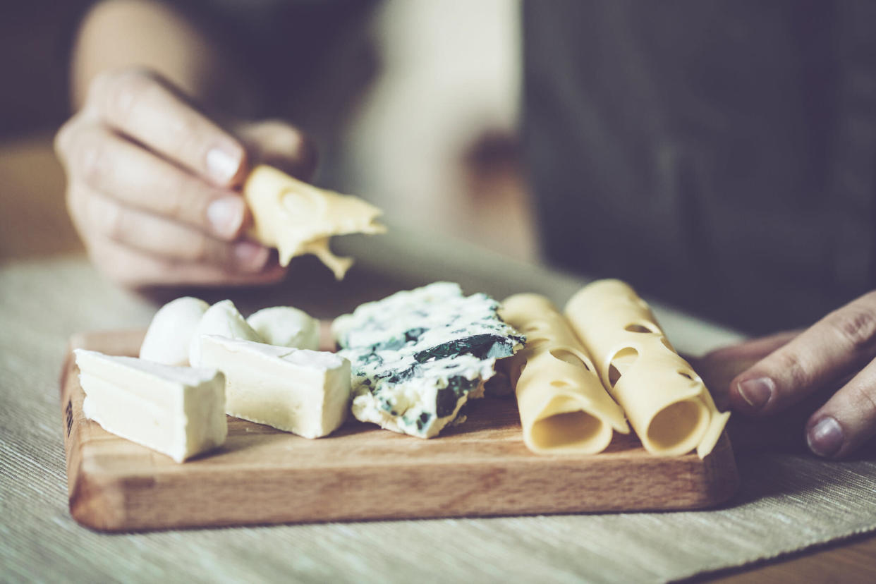 What happens to your body when you eat a lot of cheese? [Photo: Getty]