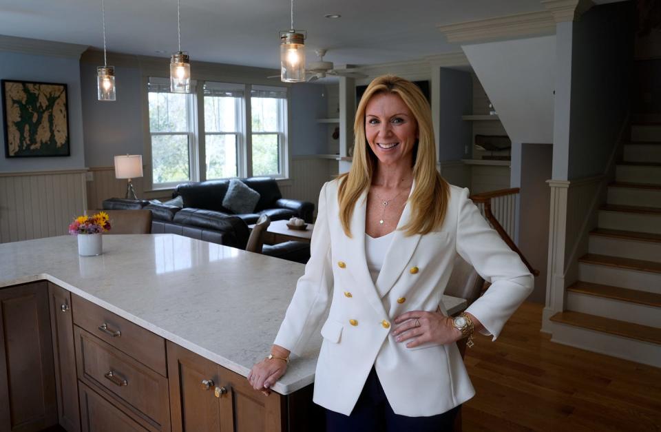Real estate agent Sarah Korolnek in the kitchen of a Little Compton home listed at $1 million.