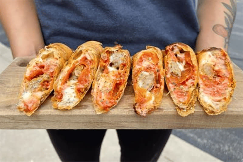 Pizza Lumpia. Lumpia (pronounced LOOM-pee-uh) is a Filipino appetizer that is comparable to an egg roll. This thin, crispy wrapper is filled with classic pizza ingredients. (Wisconsin State Fair)