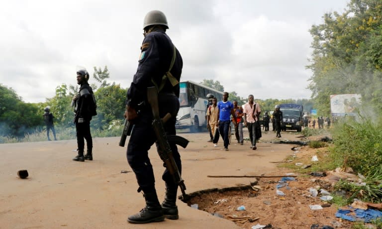 Four people were killed when police clashed May 23 with former rebels who had blocked the road into Bouake, Ivory Coast's second biggest city, to demand government compensation payments