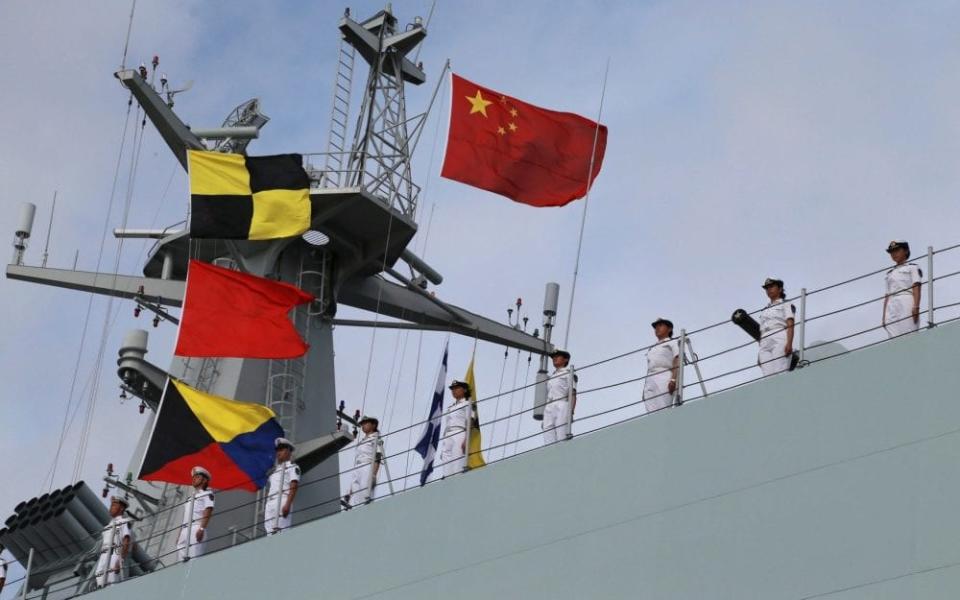 The Chinese flag flies from the ship 