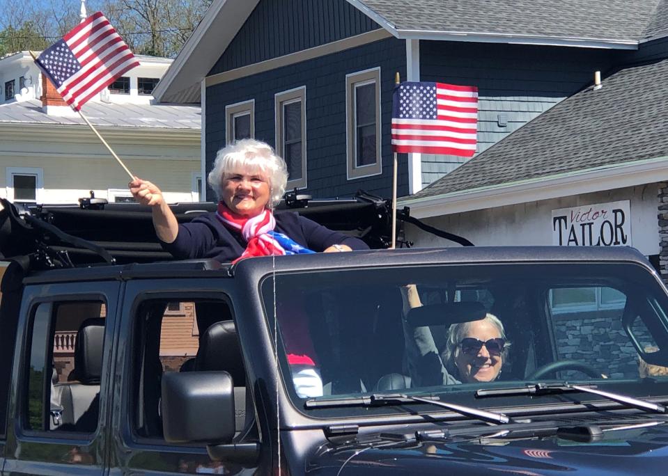 Lots of red, white and blue will be waving on Memorial Day when the parade returns to Canandaigua, just like it did last holiday in Victor (above). Both the Canandaigua and Victor Memorial Day parades are scheduled to start at 10 a.m. Monday.