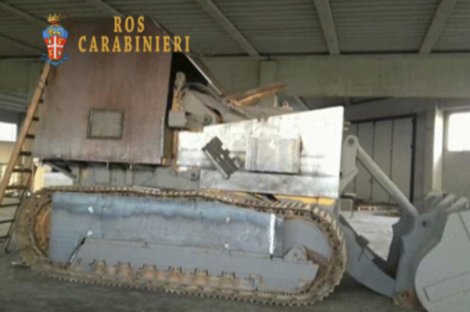 This frame grab taken from a video released by the Italian Carabinieri (Paramilitary police), Wednesday, April 2, 2014, shows a makeshift armored vehicle that was seized in Casale di Scodosia, Italy, by the ROS (Italian Carabinieri special operations units) during an operation that led to the arrest of 24 secessionists who were allegedly planning a violent campaign aimed at gaining independence for the wealthy northeastern Veneto region. Police said in a statement that the group had built an armored vehicle that they intended to deploy in St. Mark's Square in Venice — reminiscent of a 7 ½-hour takeover of the piazza's famed bell tower by secessionists in 1997. TV footage showed the so-called tank was a tractor that had been armed in some fashion. Italian media reported that the secessionists intended to deploy the vehicle on the eve of European Parliamentary elections in May, which will be a measure of growing anti-Europe sentiment arising from harsh austerity measures to fight the economic crisis. (AP Photo/Carabinieri)