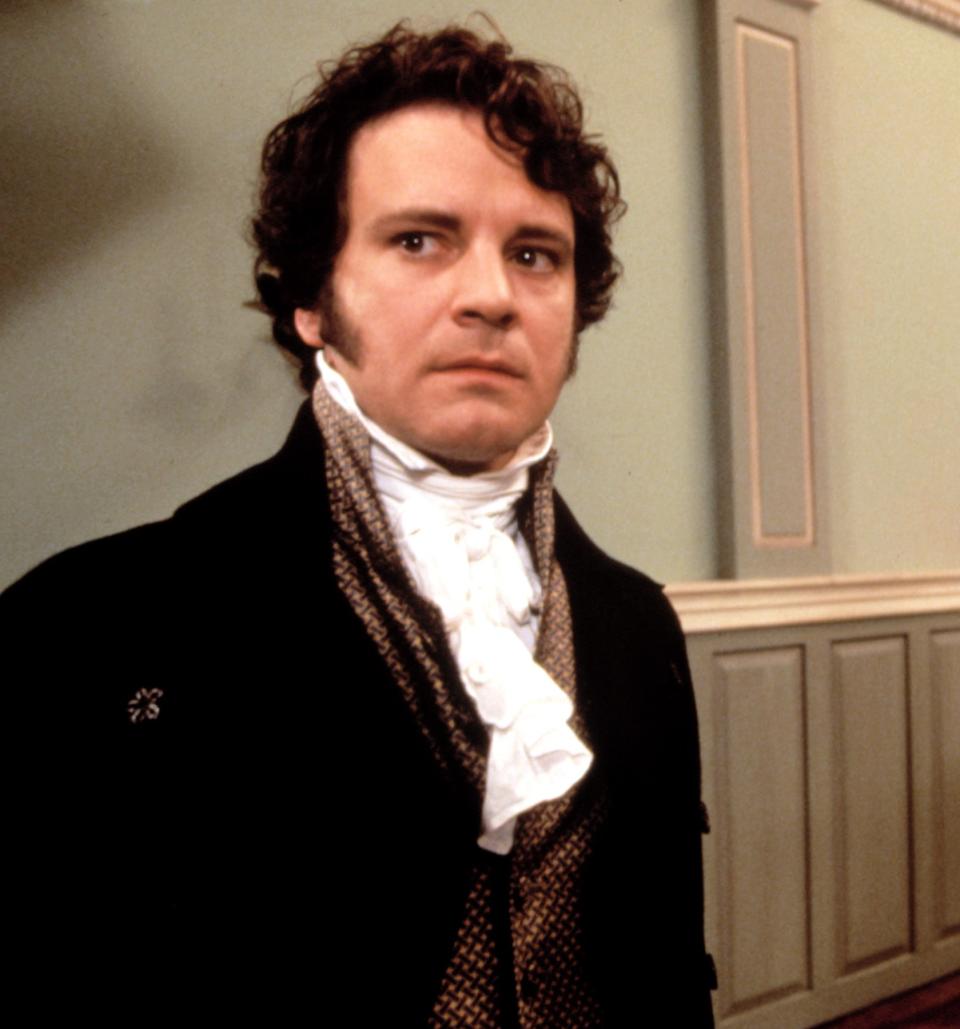 Colin Firth in period attire with high collar as Mr. Darcy