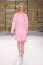 <p><i>Lady Gaga’s former stylist Nicola Formichetti created Nicopanda. Here, a model wears a bright pastel pink raincoat and matching skirt from the brand. (Photo: ImaxTree) </i></p>