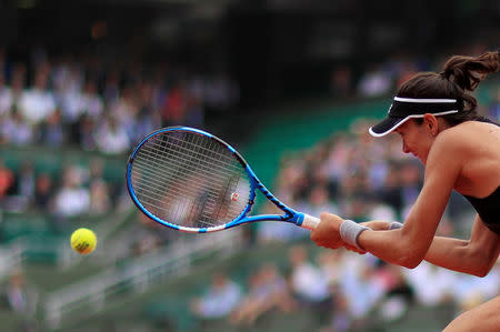 Tennis - French Open - Roland Garros, Paris, France - June 6, 2018 Spain's Garbine Muguruza in action during her quarter final match against Russia's Maria Sharapova REUTERS/Gonzalo Fuentes