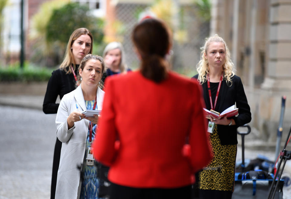 Reporters listen to Queensland Premier Annastacia Palaszczuk during a press conference at Parliament House in Brisbane.  Source: AAP