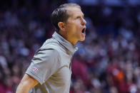 Arkansas head coach Eric Musselman shouts in the first half of an NCAA college basketball game against Oklahoma, Saturday, Dec. 11, 2021, in Tulsa, Okla. (AP Photo/Sue Ogrocki)