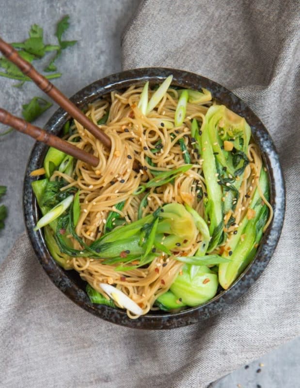 <p>These sesame ginger noodles with bok choy are quick, easy, and so delicious!</p><p><strong>Get the recipe: <a href="https://choosingchia.com/15-minute-sesame-ginger-noodles/" rel="nofollow noopener" target="_blank" data-ylk="slk:15-Minute Sesame Ginger Noodles with Bok Choy;elm:context_link;itc:0;sec:content-canvas" class="link rapid-noclick-resp"><em>15-Minute Sesame Ginger Noodles with Bok Choy</em></a></strong></p>